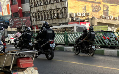 A picture obtained by AFP outside Iran reportedly shows Iranian police patrolling in the capital Tehran on October 8, 2022. (AFP)