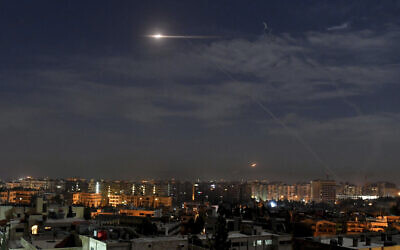 Illustrative: This photo released by the Syrian official news agency SANA shows missiles in the sky near the international airport, in Damascus, Syria, on January 21, 2019. (SANA via AP)