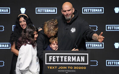 Pennsylvania Lt. Gov. John Fetterman, Democratic candidate for US Senate from Pennsylvania, right, is joined by his family after addressing supporters at an election night party in Pittsburgh, November 9, 2022. (Gene J. Puskar/AP)