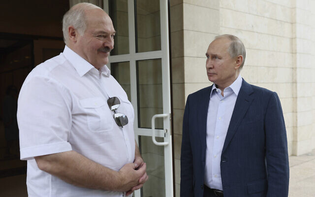 Russian President Vladimir Putin, left, and Belarusian President Alexander Lukashenko speak during their meeting at the Bocharov Ruchei residence in the resort city of Sochi, Russia, June 9, 2023. (Gavriil Grigorov, Sputnik, Kremlin Pool Photo via AP)