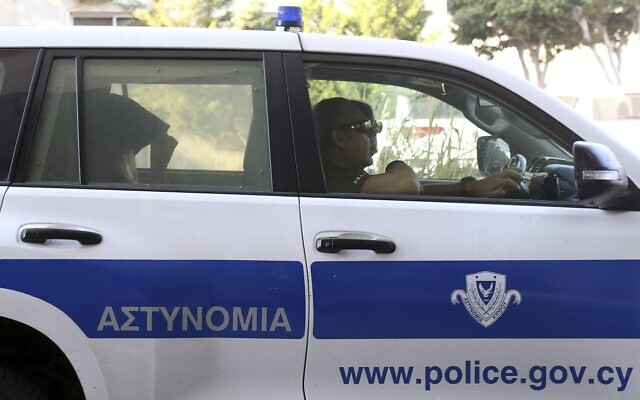 Illustrative: Police officers in Paralimni, Cyprus, August 19, 2019. (AP/ Philippos Christou)