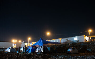 Settlers seen at the illegal outpost of Evyatar in the West Bank on June 29, 2021. (Sraya Diamant/Flash90)