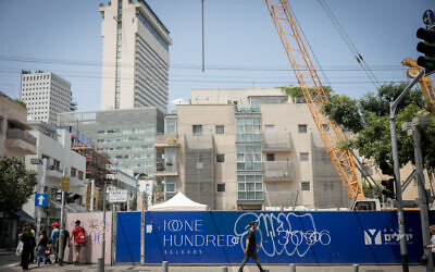 Illustrative: Construction of new residential buildings on Allenby Street in Tel Aviv, May 21, 2023. (Miriam Alster/Flash90)