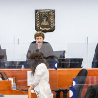 Judges take their seats at the Jerusalem District Court judges to listen to the testimony of businessman Arnon Milchan in Prime Minister Benjamin Netanyahu's corruption trial on June 25, 2023. (Oren Ben Hakoon/POOL)