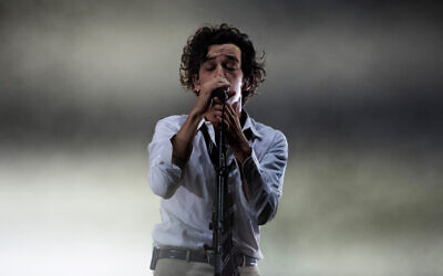 The leader singer of British pop rock band The 1975, Matt Healy, performs on the second day of the Benicassim International Music Festival (FIB) in Benicassim, Spain, July 20, 2019. (Jose Jordan/AFP)