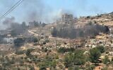 Photos show an attack by settlers on the Palestinian village of Umm Safa in the West Bank on June 24, 2023. (Yesh Din)