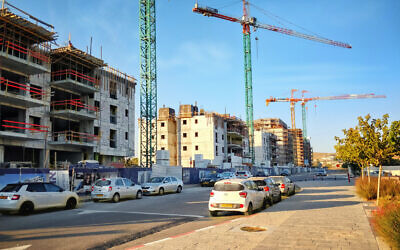 Illustrative. Apartment buildings under construction in Beersheba's Ramot neighborhood, August 2018. (verbaska_studio via iStock by Getty Images)