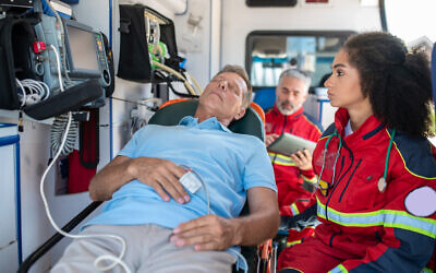 Illustrative image: a medic monitors a patient and checked his heart rate (Zinkevych  via iStock by Getty Images)