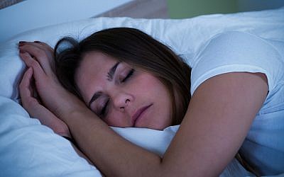 Illustrative image of a sleeping woman. (AndreyPopov; iStock by Getty Images)