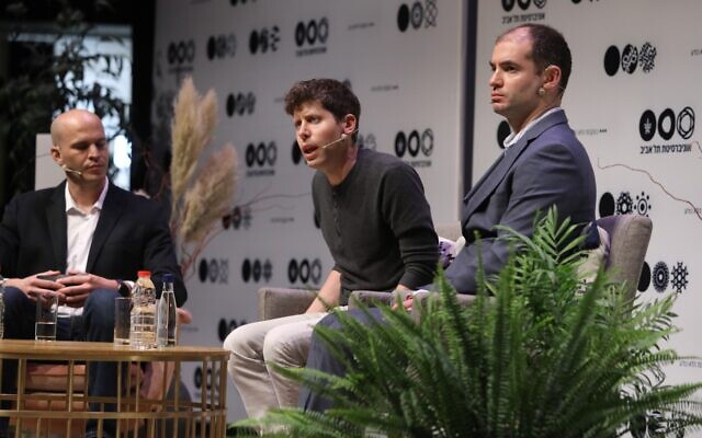 OpenAI co-founders Sam Altman (center) and Ilya Sutskever (right) on a panel at Tel Aviv University, June 5, 2023. (Chen Galili)